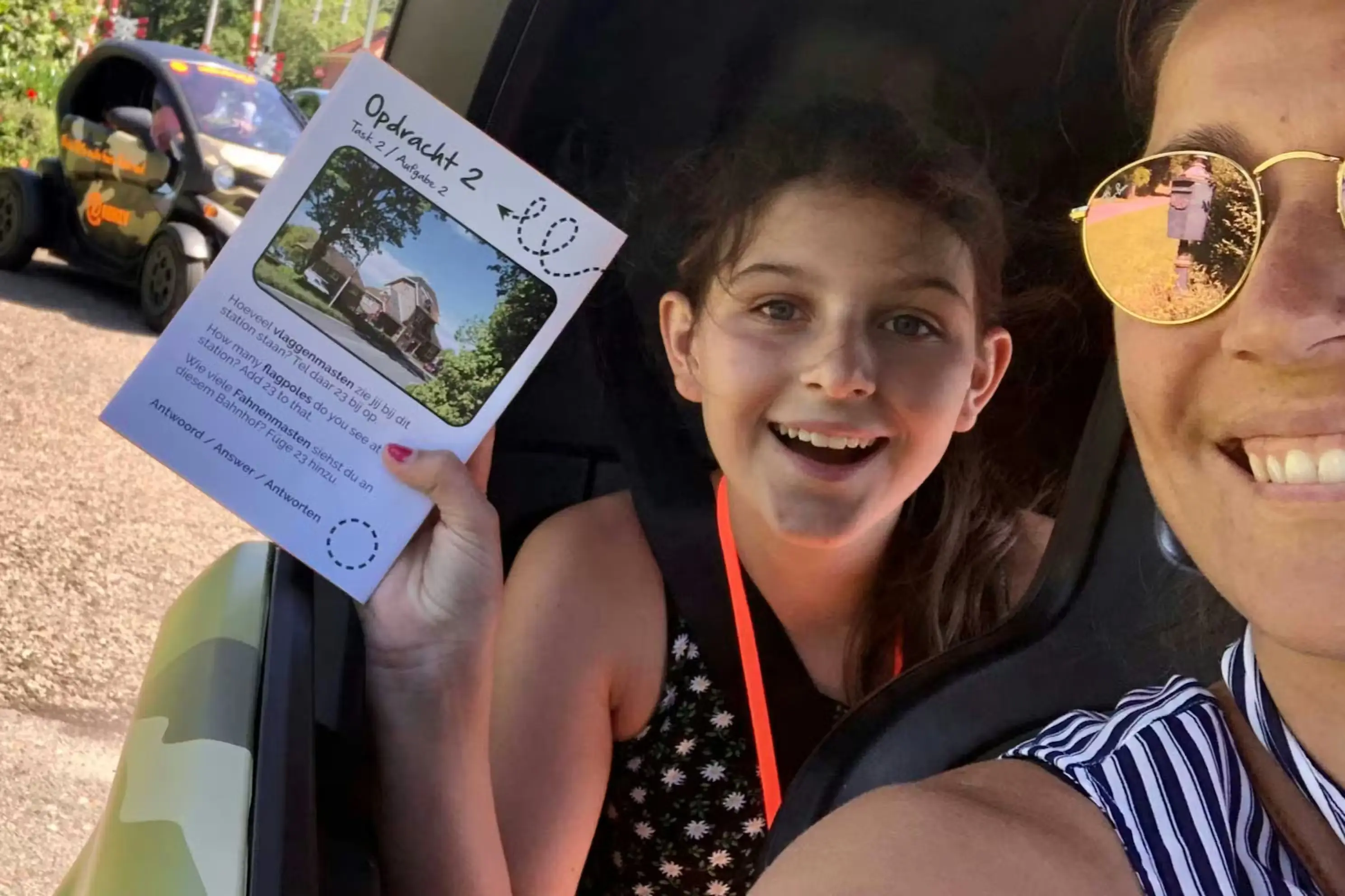 Tourists having fun in electic car on tulip tour