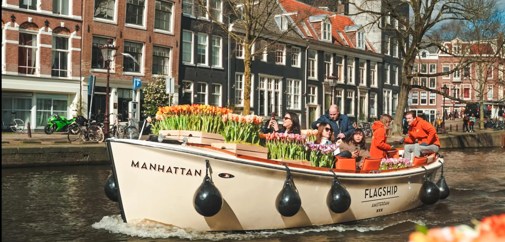 Guests enjoying the Amsterdam canal cruise during tulip season